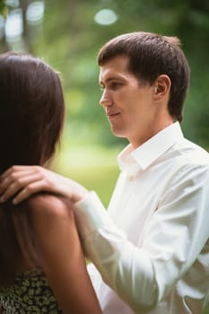 Beautiful young couple in the park.