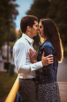 Beautiful young couple on the waterfront.