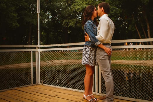 Beautiful young couple on the waterfront.