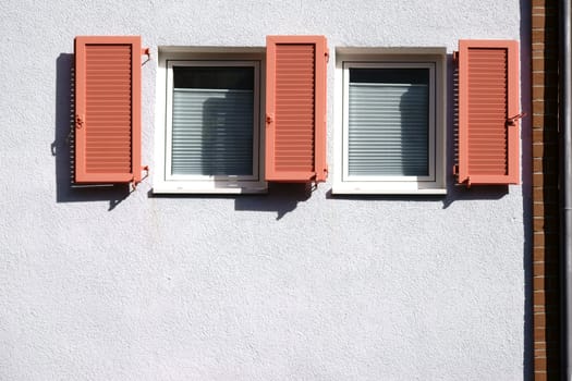 Opened new wooden shutter on a house...