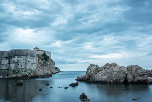 View of the Adriatic Sea with the historic old city of Dubrovnik, Croatia on the left