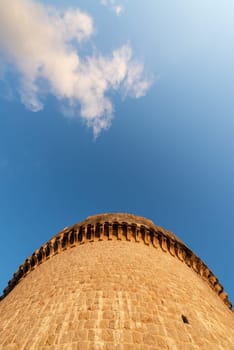 Looking up at an imposing defensive tower in Dubrovnik, Croatia