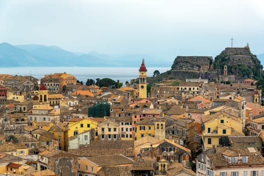 Cityscape of Corfu, Greece with the Old Fortress in the background