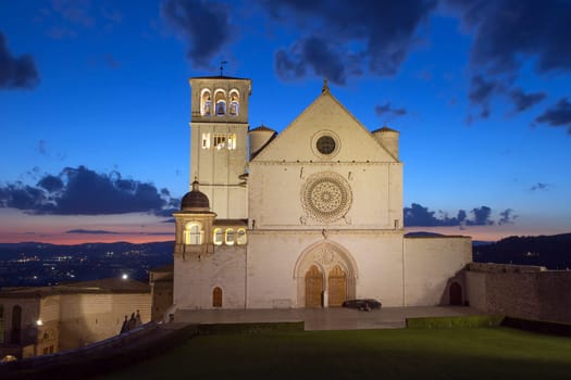 The Papal Basilica of St. Francis of Assisi at sunset (Assisi, Umbria, Italy). Horizontally.