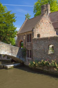 The famous ancient old stone bridge in Bruges (Flanders, Belgium)