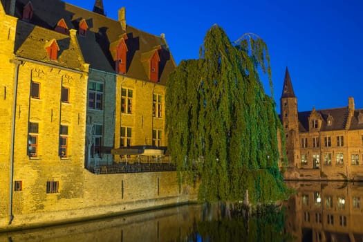 Night view from the Rozenhoedkaai of the Old Town of Bruges (Bruges, Belgium).