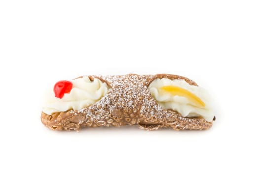 Typical sicilian dessert, cannoli, with candied fruit.