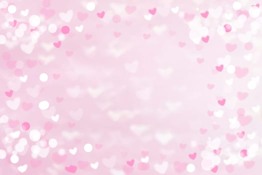 Abstract festive blur bright pink pastel background with pink and white hearts love bokeh for wedding card or Valentine‘s day. Romantic textured backdrop with space for your design. Card concept.