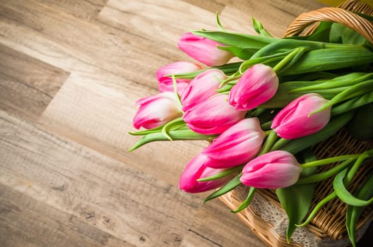 Beautiful bouquet from pink tulips  on a table