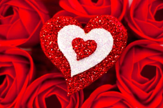 Rose petals and red heart