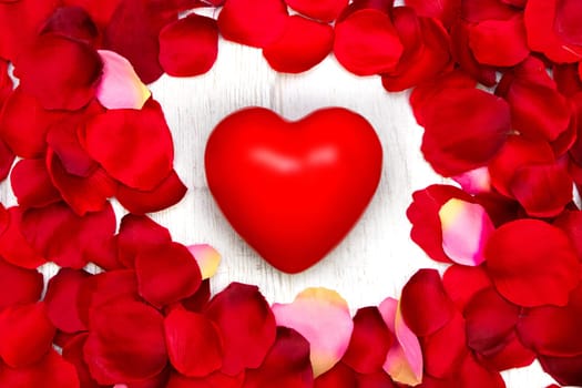 Rose petals and red heart