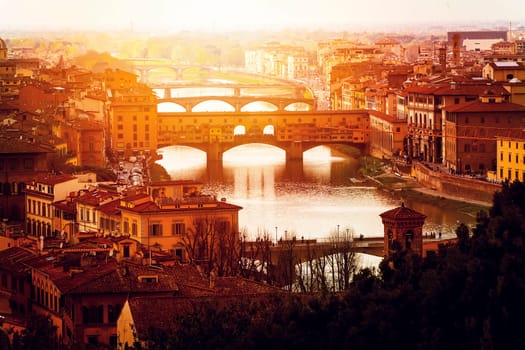 sunset over Ponte Vecchio in Florence. Seasonal concept. Tourism destination
