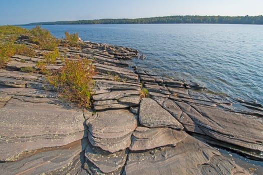 Weathered Rocks and Water on the Great Lakes Shore in Lake Huron in KillBear Provincial Park in Ontario