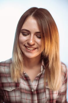 portrait smiling girl on white background in studio.