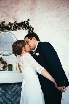 couple groom and bride in the studio.