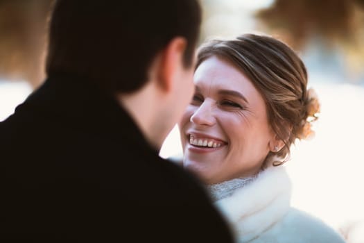 Lovers bride and groom on their winter wedding.