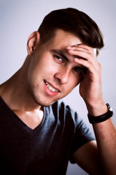 handsome young man in photo studio white background.
