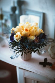 Wedding bouquet of flowers roses on a white studio background.