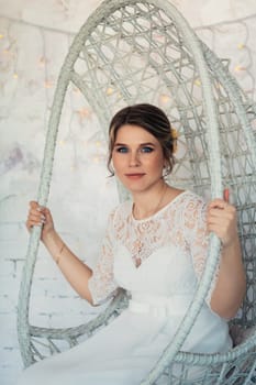 portrait of a bride in white studio.