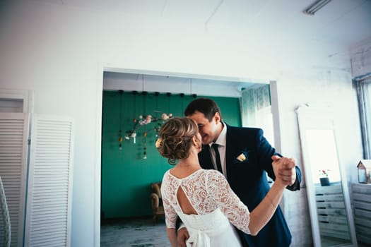 couple groom and bride in the studio.