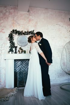 couple groom and bride in the studio.