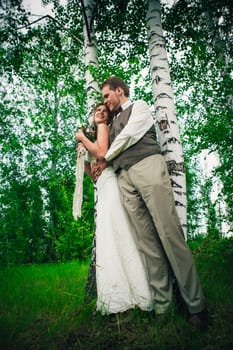 Young bride and groom in the style of provence.
