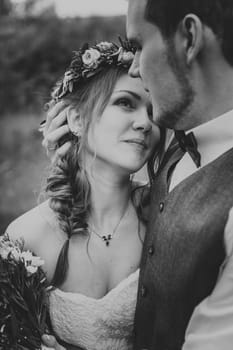 blackwhite photo young couple in the style of provence on background of river.