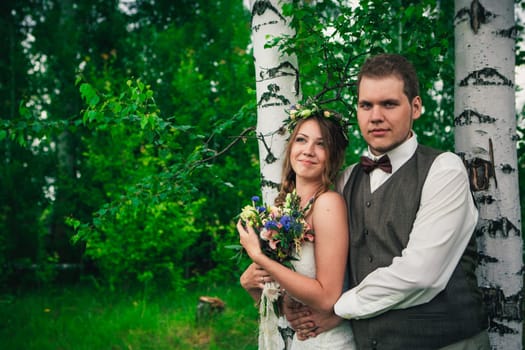 Young bride and groom in the style of provence.