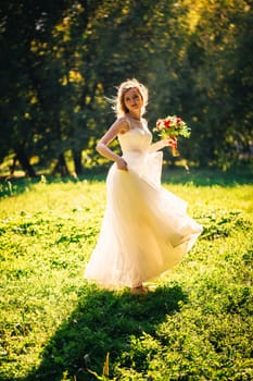 beautiful young bride in the garden background.