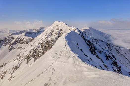 The Moldoveanu Peak in winter. Fagaras Mountains, Romania