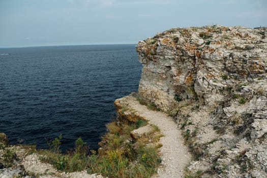landscape river cliff grass on the sky background.