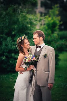 Young bride and groom in the style of provence.