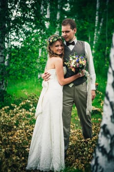 Young bride and groom in the style of provence.