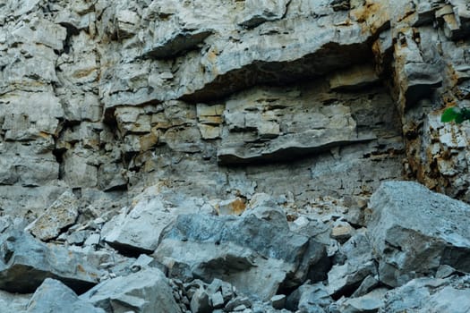dark detailed grey stone background close up.