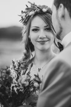 blackwhite photo young couple in the style of provence on background of river.