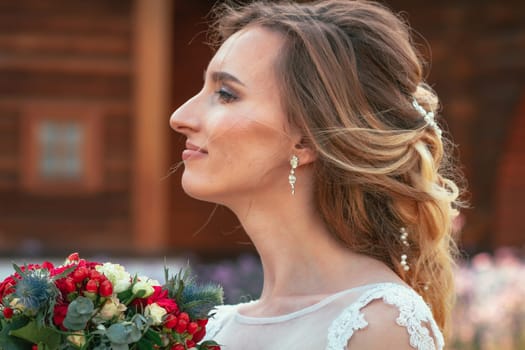 beautiful young bride in the garden background.
