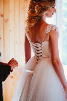 Beautiful young bride on blurred background.