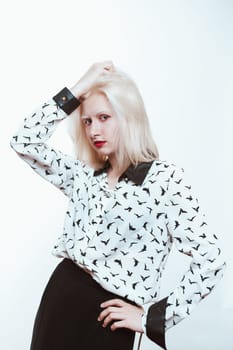 portrait blonde albino girl in studio on white background.