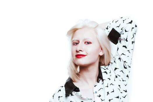 portrait blonde albino girl in studio on white background.