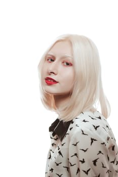 portrait of blonde albino girl in studio.