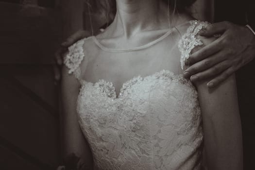 black white photo Portrait young beauty bride near the window.