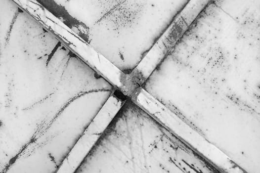 Rusty metal weathered and worn abstract background texture. Black and white.