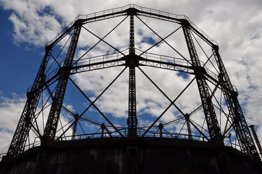 Rusty gasholder exterior abstract industrial architecture.