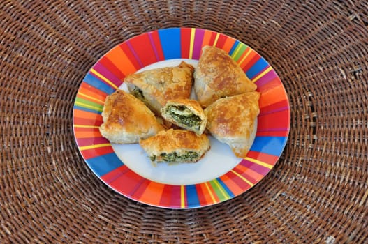 Spanakopita spinach pie with feta cheese and crispy filo dough. Greek food.