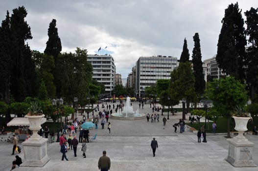 ATHENS, GREECE - MAY 6, 2014: People at Syntagma square in downtown Athens, Greece.