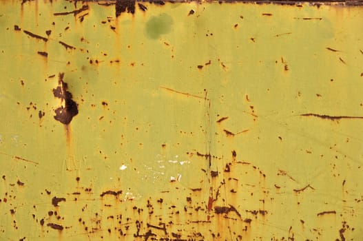 Textured rusty metal weathered and worn abstract background.