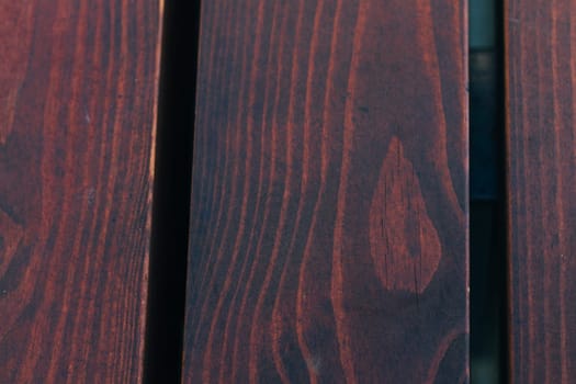 red black wooden background close up.
