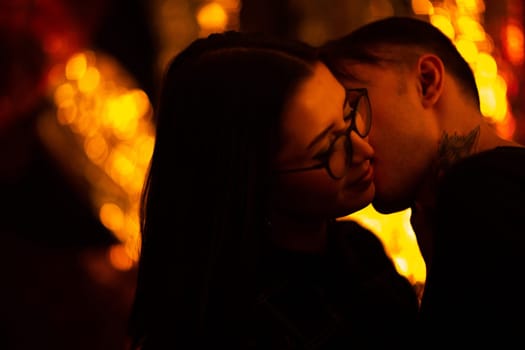 Girl and boyfriend on light sunshine background.