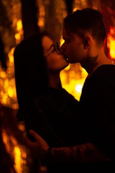 Girl and boyfriend on light sunshine background.