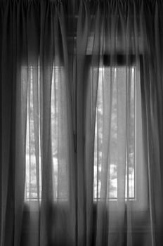 Closed window curtain abstract background. Black and white.